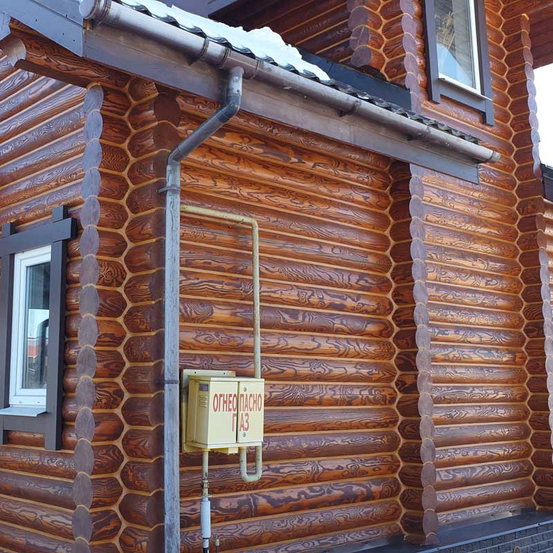 Отделка фасада деревянного дома